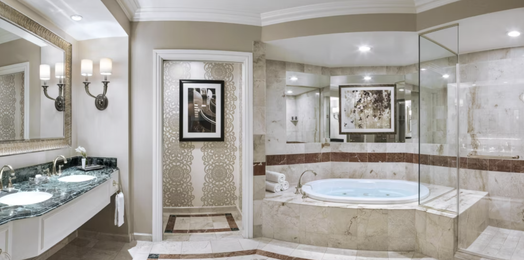 The Venetian Suite bathroom featuring a walk-in shower and soaking tub